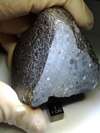 Illustration for article titled Moroccan Meteorite May Be a 4.4-Billion-Year-Old Chunk of Martian Crust